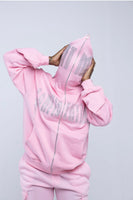 black and pink confidential rhinestone zip up RTM on face