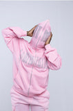 black and pink confidential rhinestone zip up RTM on face