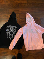 black and pink confidential rhinestone zip up RTM on face