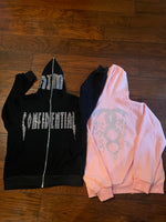 black and pink confidential rhinestone zip up RTM on face